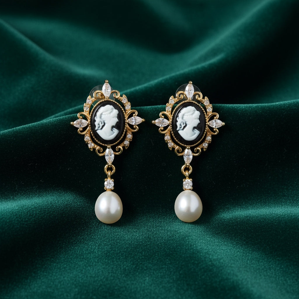 Charmluna vintage cameo drop earrings with black portrait centers, crystal accents, gold scrollwork, and pearl drops.